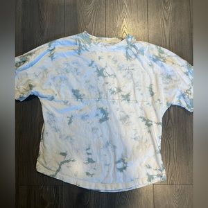 Pink by VS T-shirt. Size medium. Color is tie dye green, cream, and yellow